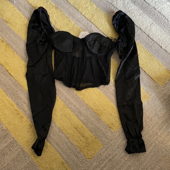 Shae Puff Top in Black Caviar
OW Intimates
XS 4 - Picture 5 of 7